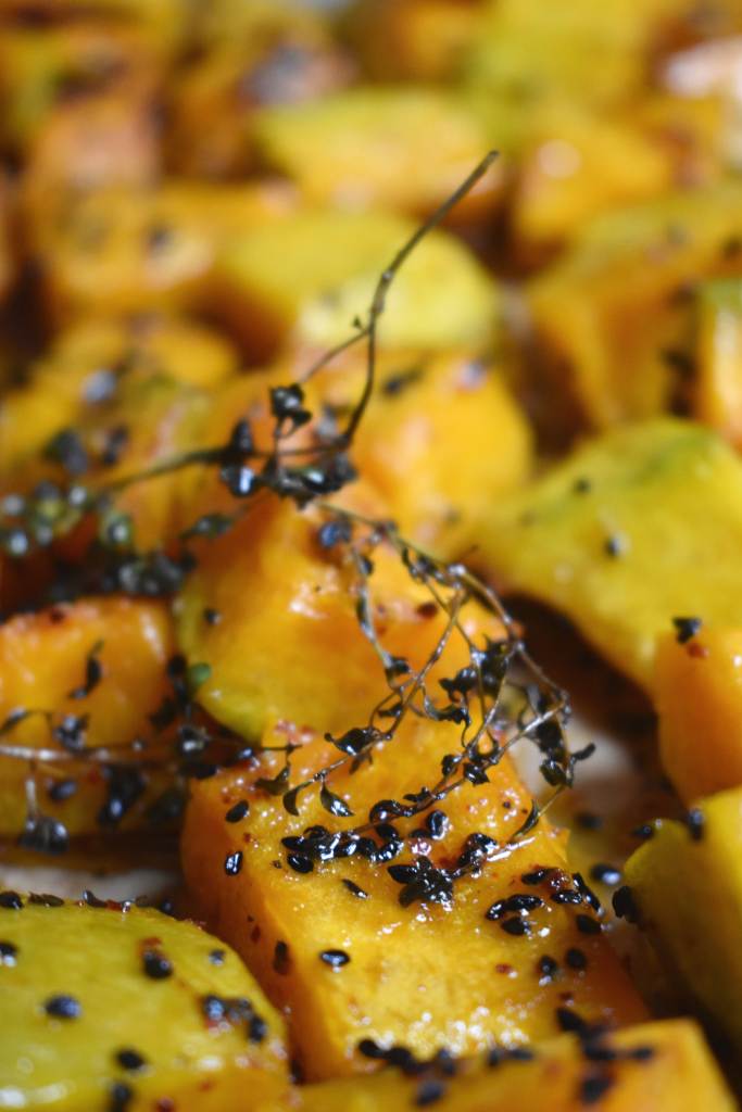 pieces of pumpkin with seeds and thyme 
